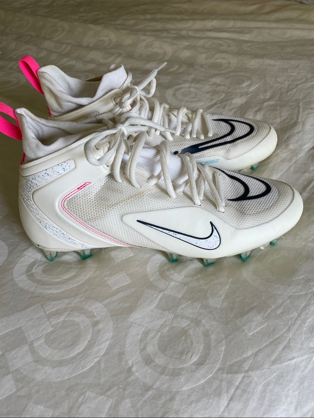 Nike White Cleats with Black Swoosh and Pink Pull Tabs